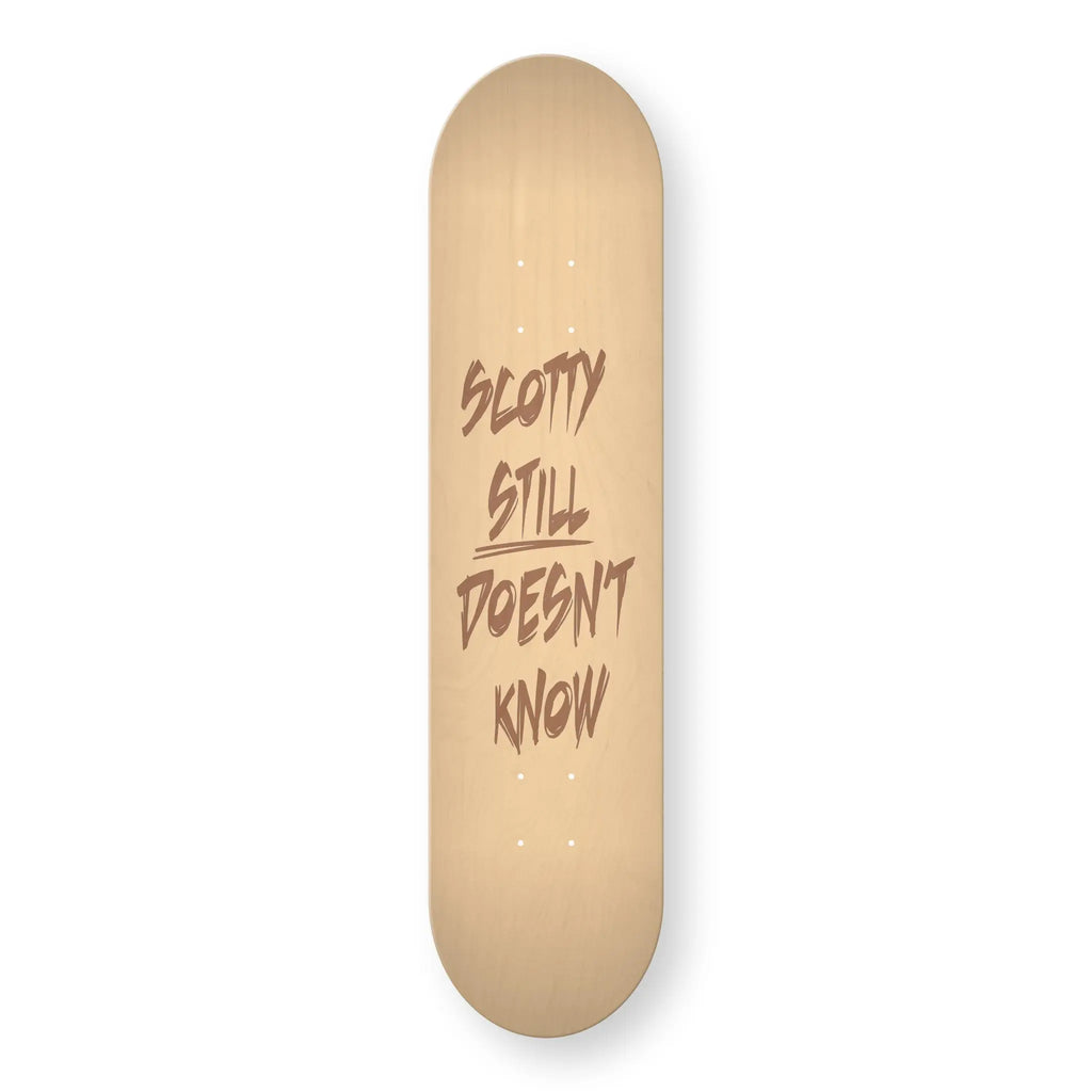 Still Doesn’t Know engraved skateboard deck in natural wood